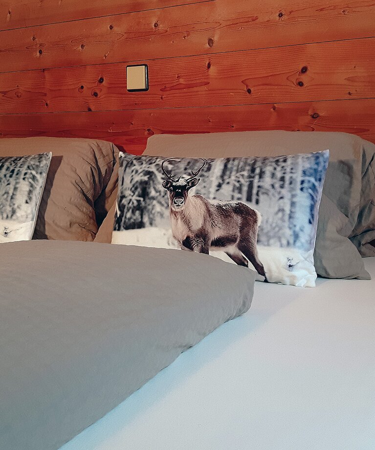 Eine Aufnahme des Doppelbetts im Appartement 1 - "Schönleiten" Schlafzimmer | © Haus Tannenblick